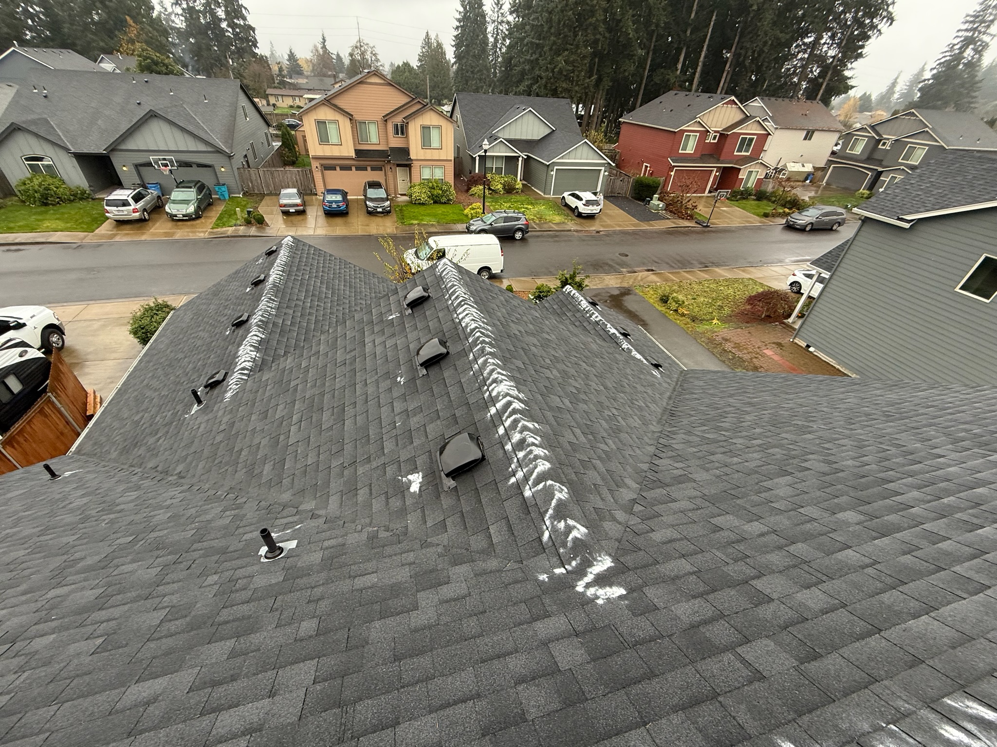 Freshly cleaned roof overlooking a Vancouver WA neighborhood from above after professional cleaning